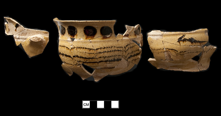 North Midlands slip decorated handled drinking pot/cup decorated with dotted, trailed and combed decoration. Rim diameter: 4.75&rdquo;; Vessel Height: 3.00&rdquo;; Object  ID: 2996. Learn more about this object at:http://mountvernonmidden.org/default.html.